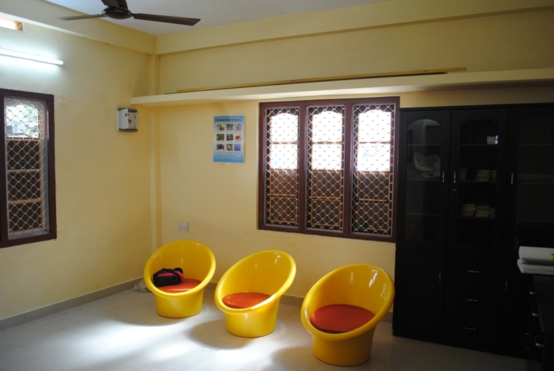 Chairs and table inside environmental education center on Kavaratti Island, India