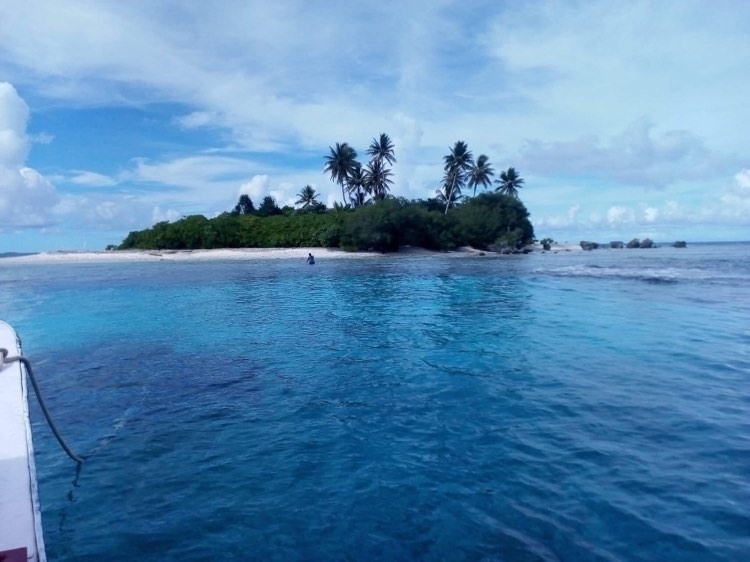 Atoll with palm trees in Chuuk, Micronesia