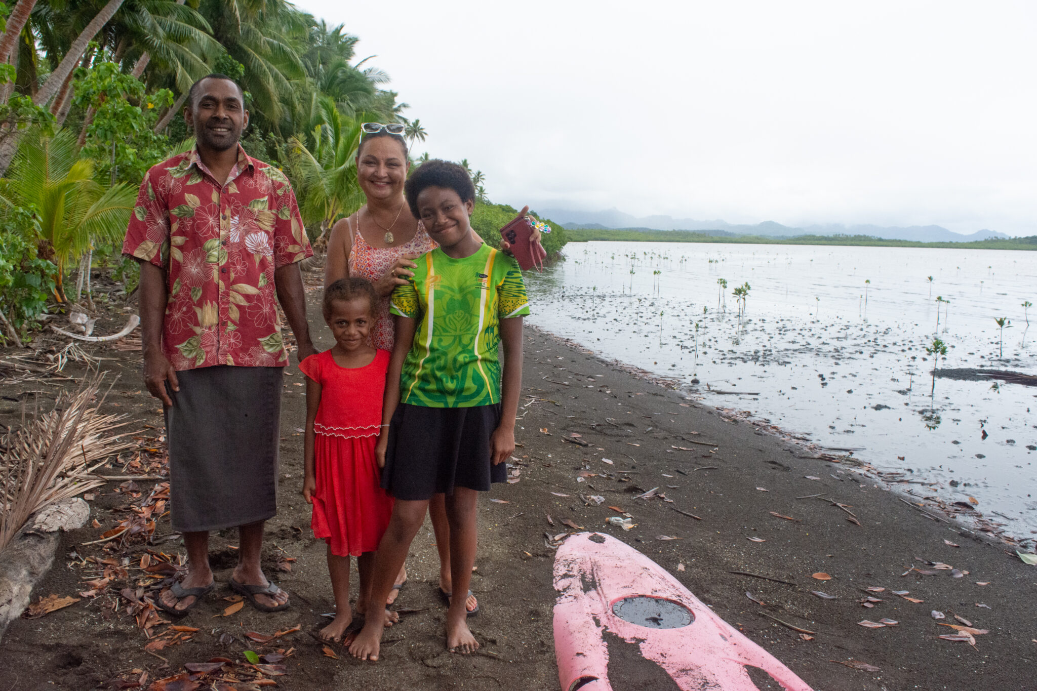 Fijian family on beach