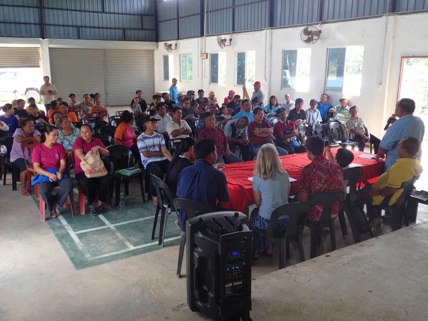 Villagers in Sabah, Malaysia gather with representatives from Seacology