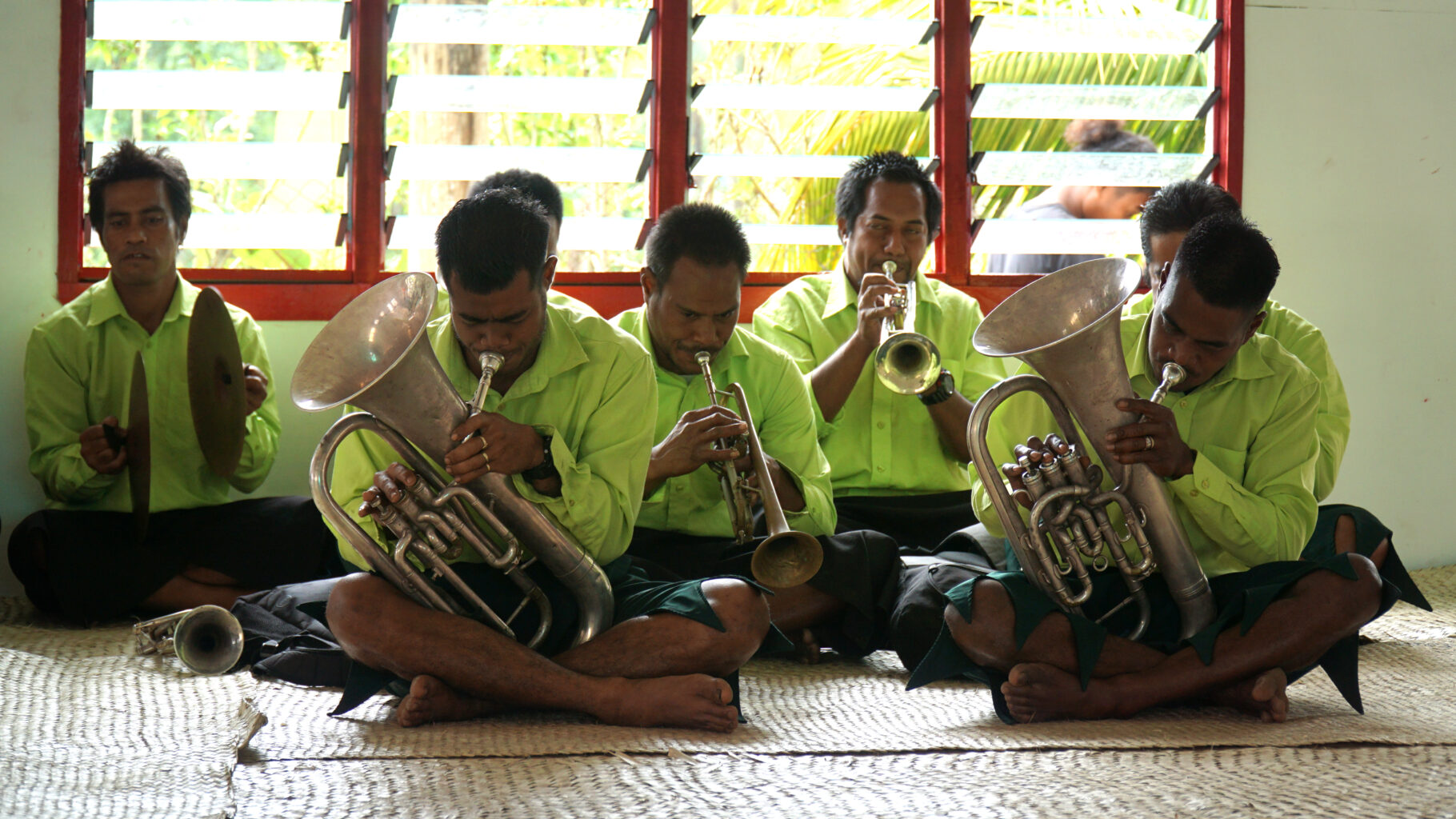 Fijian youth play in a brass band