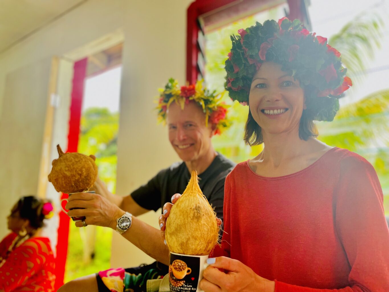 Trip participants drink from coconuts