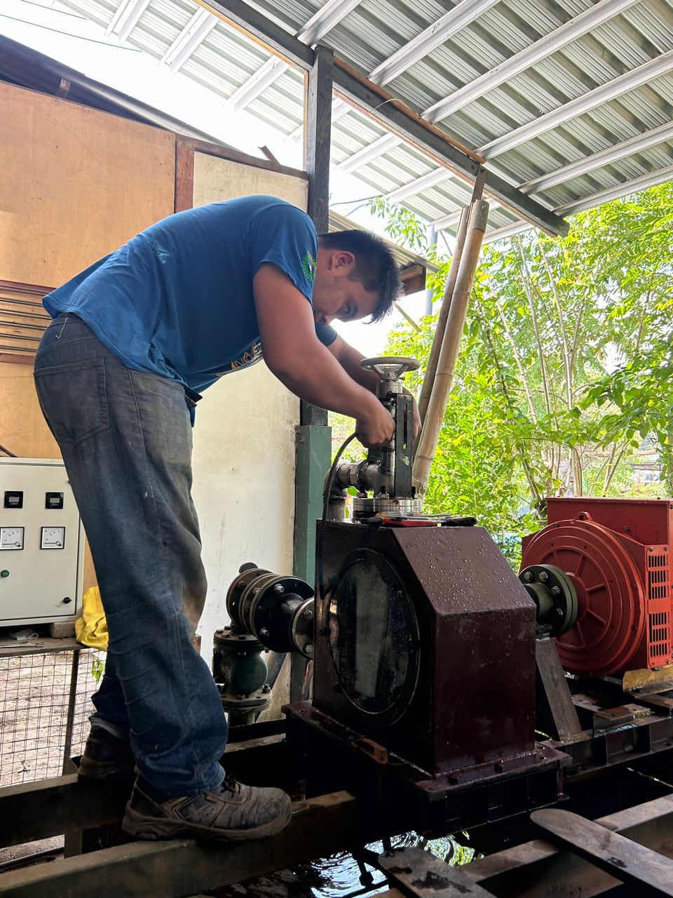 A man installs the generator
