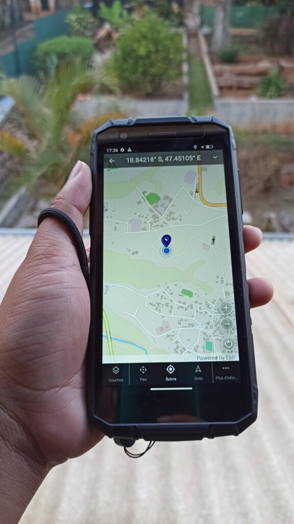 A person holds a GPS map device