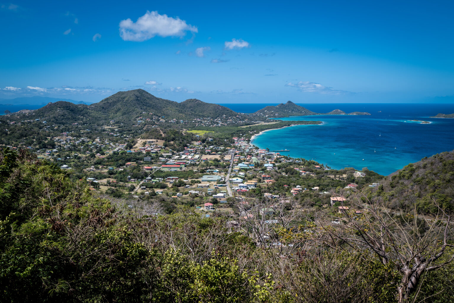 An aerial view of Lauriston Point, Grenada, on a blue bay