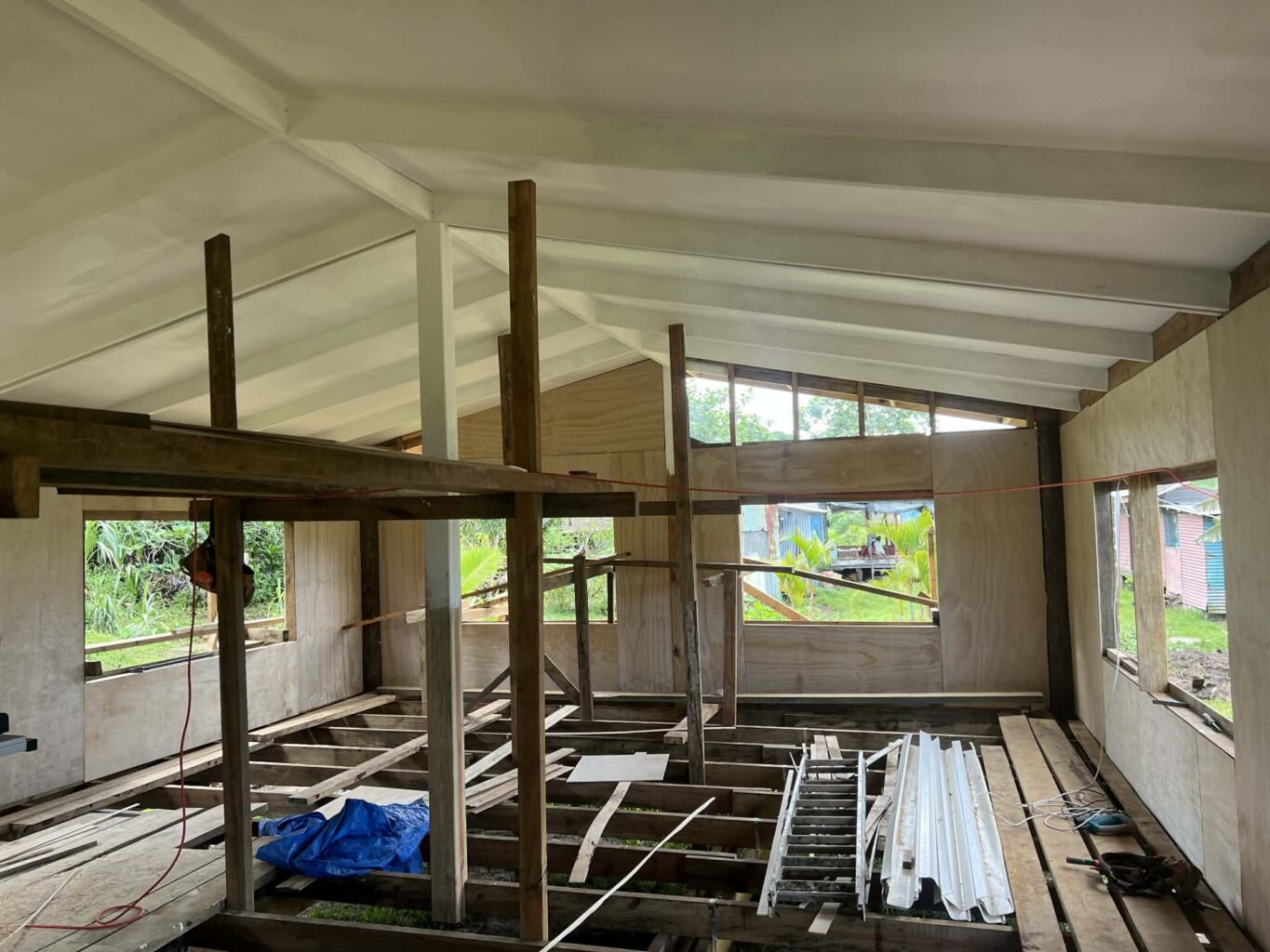 A partially constructed schoolhouse interior