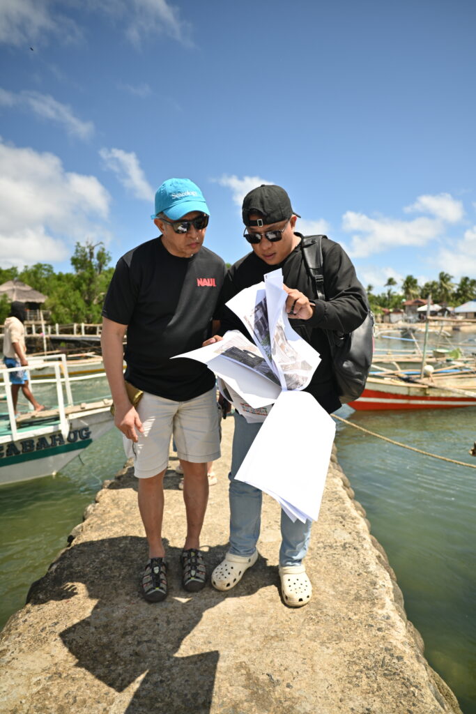 Engineer explaining repairs made to Field Rep Ferdie Marcelo