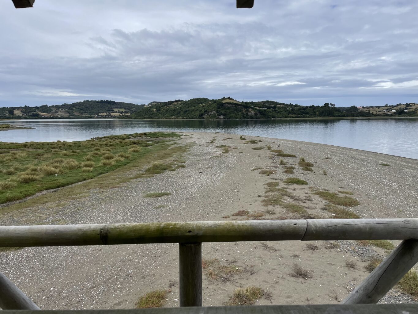 A stretch of beach and water seen from the viewing deck