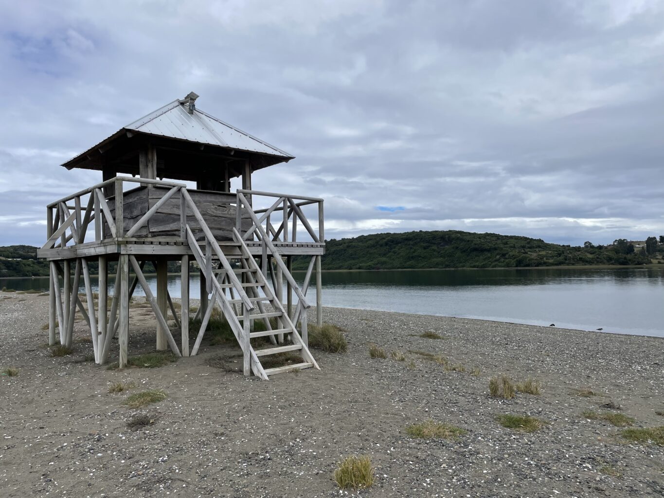 The 2-story covered viewing platform next to the water
