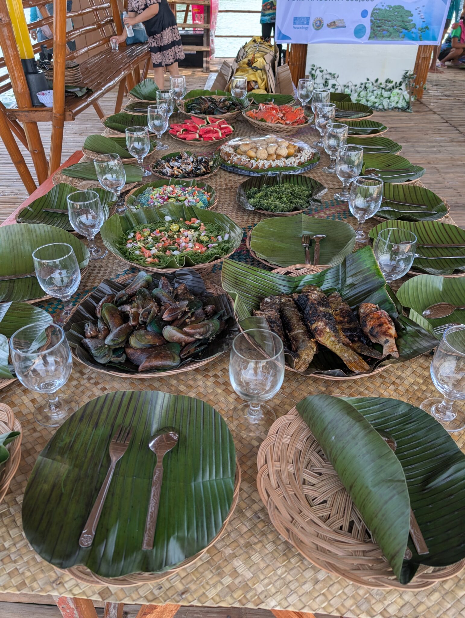 A long table spread with food